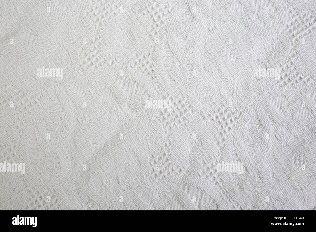 Tissu de table à motifs vintage, plis de tissu blanc Banque D'Images