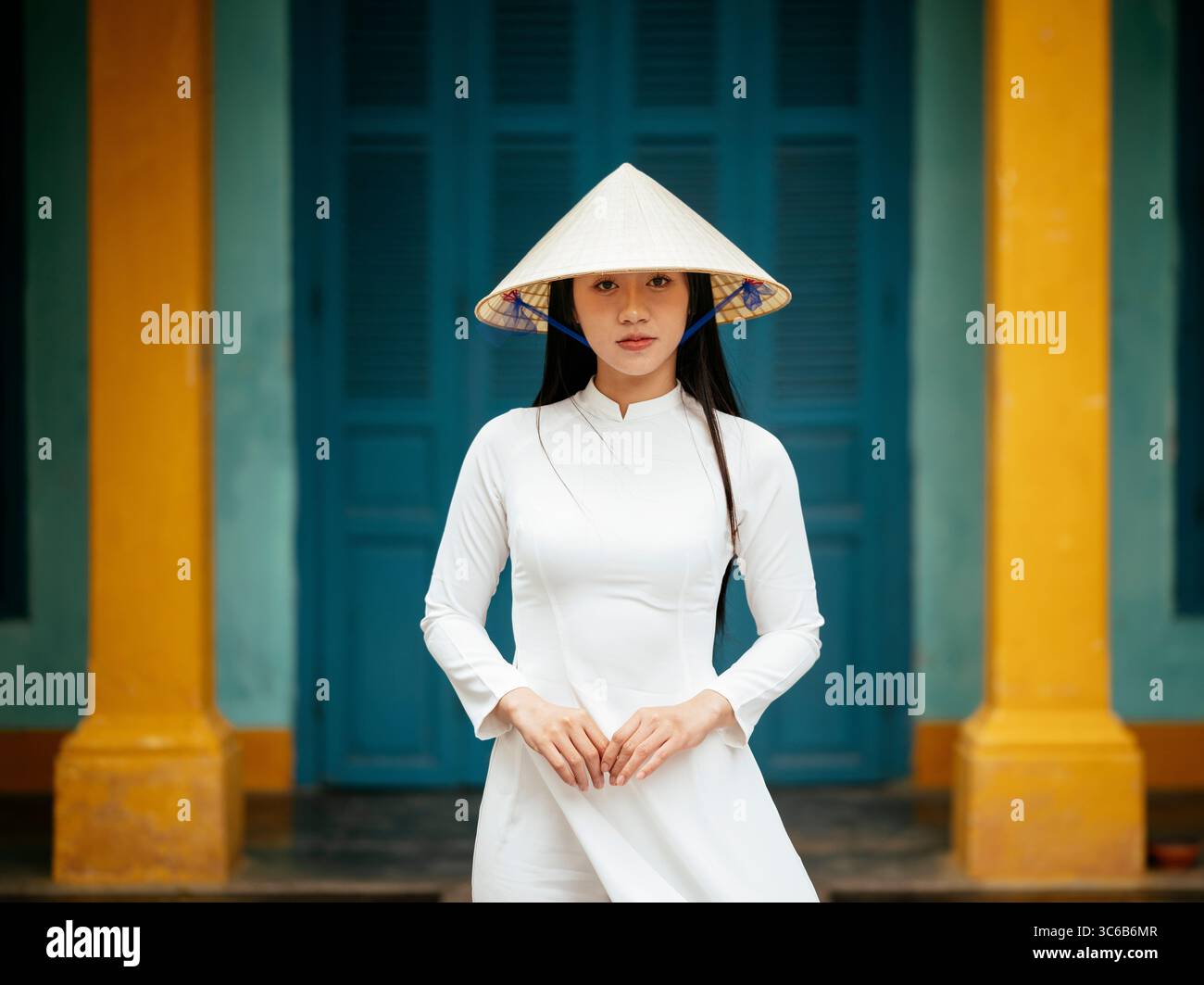 Vietnamienne à ao dai, Hoi an, province de Quảng Nam, Vietnam Banque D'Images