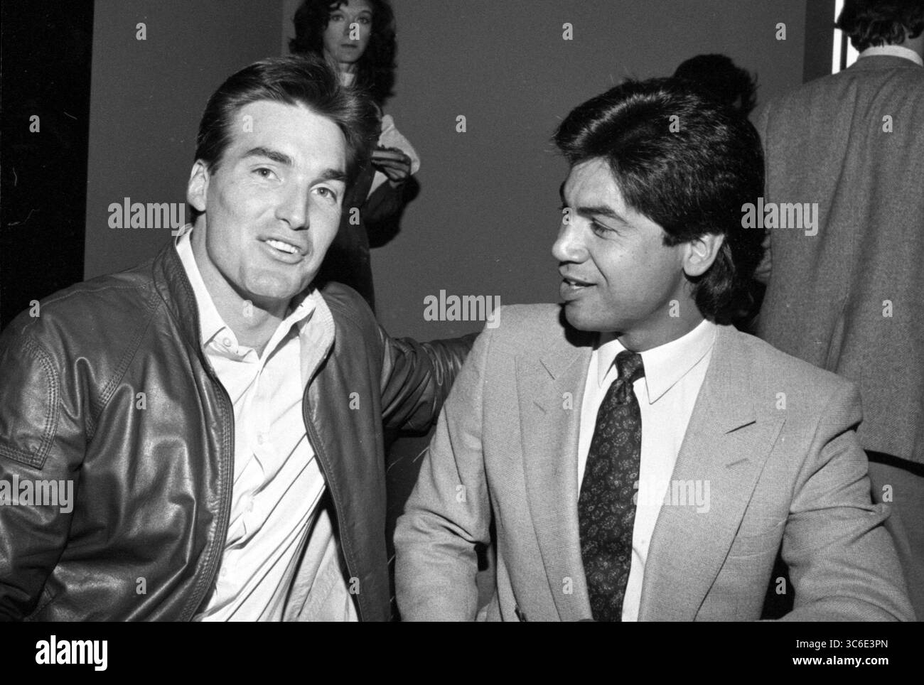 Sam Jones et personne non identifiée Circa 1980’s Credit : Ralph Dominguez/MediaPunch Banque D'Images