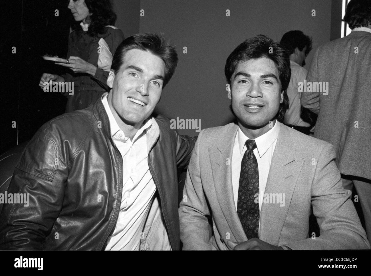 Sam Jones et personne non identifiée Circa 1980’s Credit : Ralph Dominguez/MediaPunch Banque D'Images