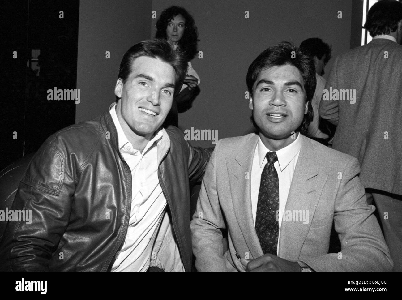 Sam Jones et personne non identifiée Circa 1980’s Credit : Ralph Dominguez/MediaPunch Banque D'Images