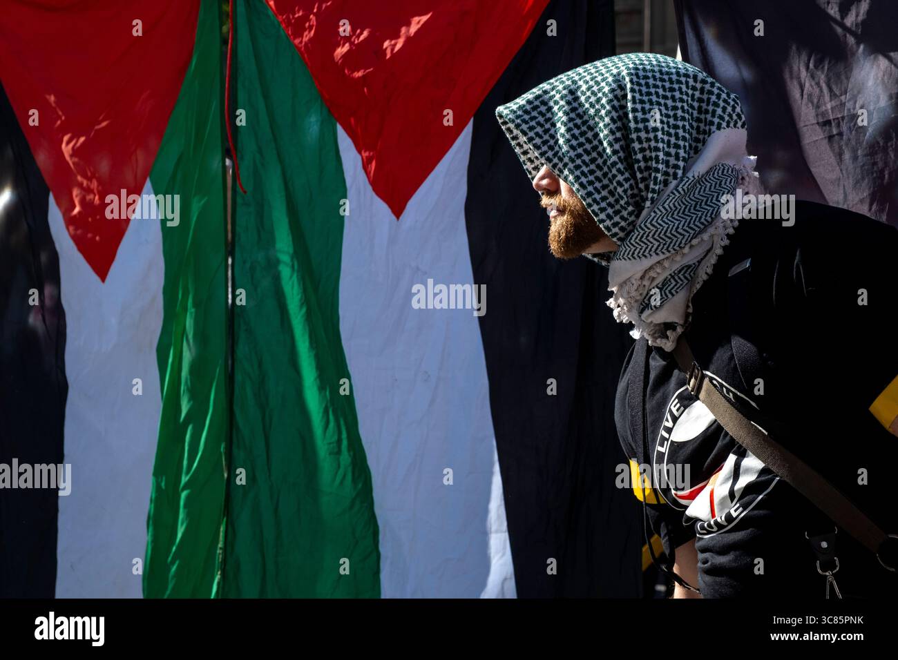 Un manifestant palestinien à Swanston Street, Mebourne, Victoria, Australie. Banque D'Images