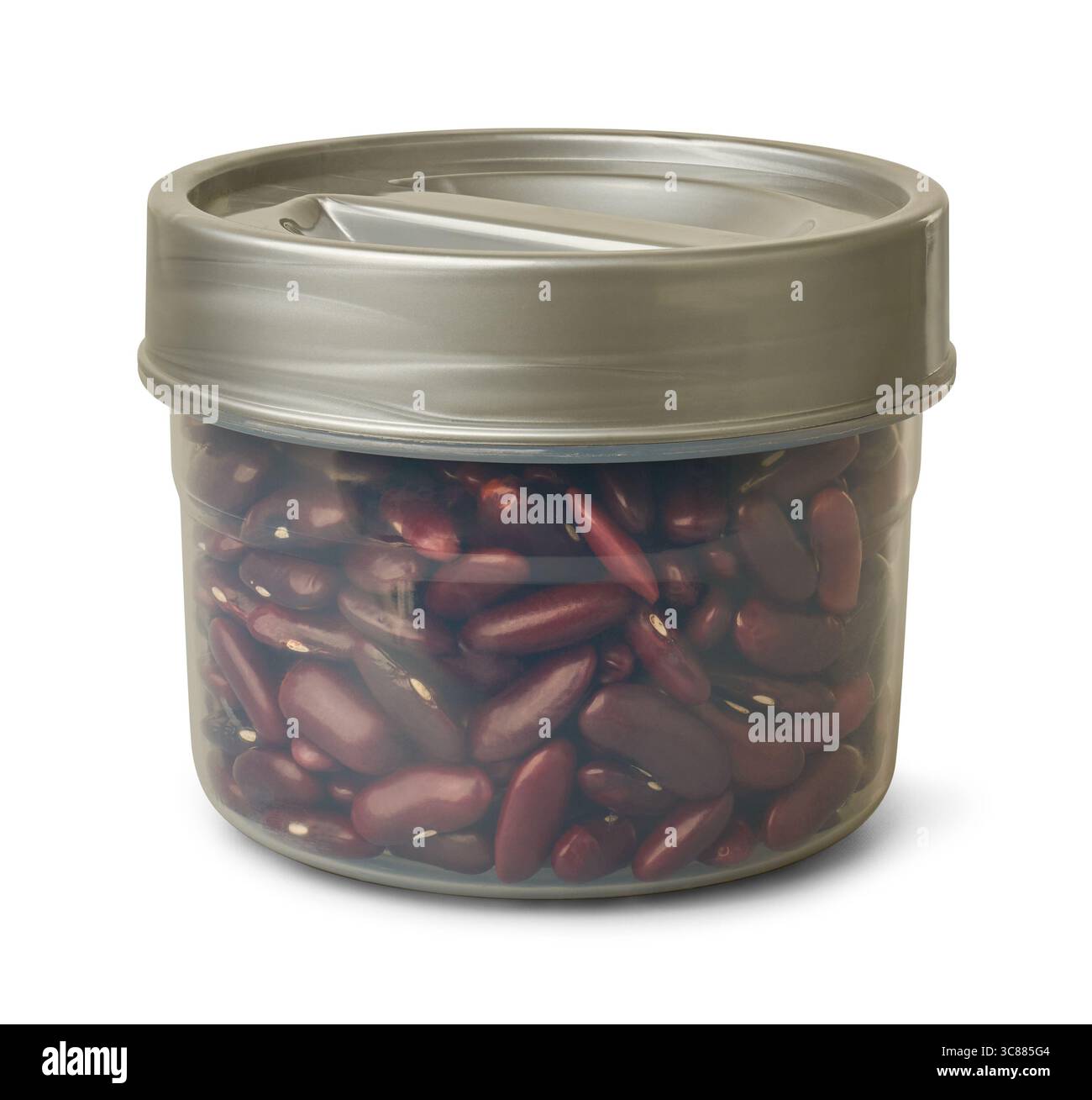 gros plan d'un pot transparent rempli de haricots rouges non cuits sur fond blanc isolé, nutrition alimentaire ou concept d'organisation de garde-manger Banque D'Images