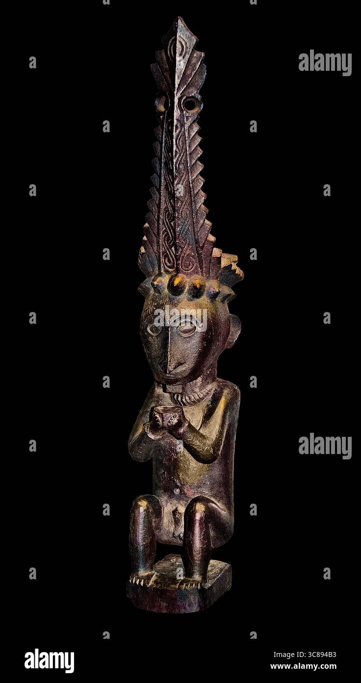 Statue d'un ancêtre adu zatua 19ème siècle île septentrionale de Nias ( Sumatra ) Indonésie , Musée - Musée du quai Branly ( 'Adu zatua' est un terme se référant à des figures ancêtres en bois de l'île de Nias, Indonésie. Ces personnages, également connus sous le nom d'Adu Zafua, ont été créés pour abriter les esprits des personnes décédées, servant de lien entre les vivants et le Royaume ancestral. Banque D'Images Statue d'un ancêtre adu zatua 19ème siècle île septentrionale de Nias ( Sumatra ) Indonésie , Musée - Musée du quai Branly ( 'Adu zatua' est un terme se référant à des figures ancêtres en bois de l'île de Nias, Indonésie. Ces personnages, également connus sous le nom d'Adu Zafua, ont été créés pour abriter les esprits des personnes décédées, servant de lien entre les vivants et le Royaume ancestral. Banque D'Images