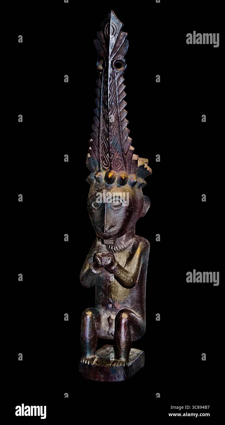 Statue d'un ancêtre adu zatua 19ème siècle île septentrionale de Nias ( Sumatra ) Indonésie , Musée - Musée du quai Branly ( 'Adu zatua' est un terme se référant à des figures ancêtres en bois de l'île de Nias, Indonésie. Ces personnages, également connus sous le nom d'Adu Zafua, ont été créés pour abriter les esprits des personnes décédées, servant de lien entre les vivants et le Royaume ancestral. Banque D'Images Statue d'un ancêtre adu zatua 19ème siècle île septentrionale de Nias ( Sumatra ) Indonésie , Musée - Musée du quai Branly ( 'Adu zatua' est un terme se référant à des figures ancêtres en bois de l'île de Nias, Indonésie. Ces personnages, également connus sous le nom d'Adu Zafua, ont été créés pour abriter les esprits des personnes décédées, servant de lien entre les vivants et le Royaume ancestral. Banque D'Images