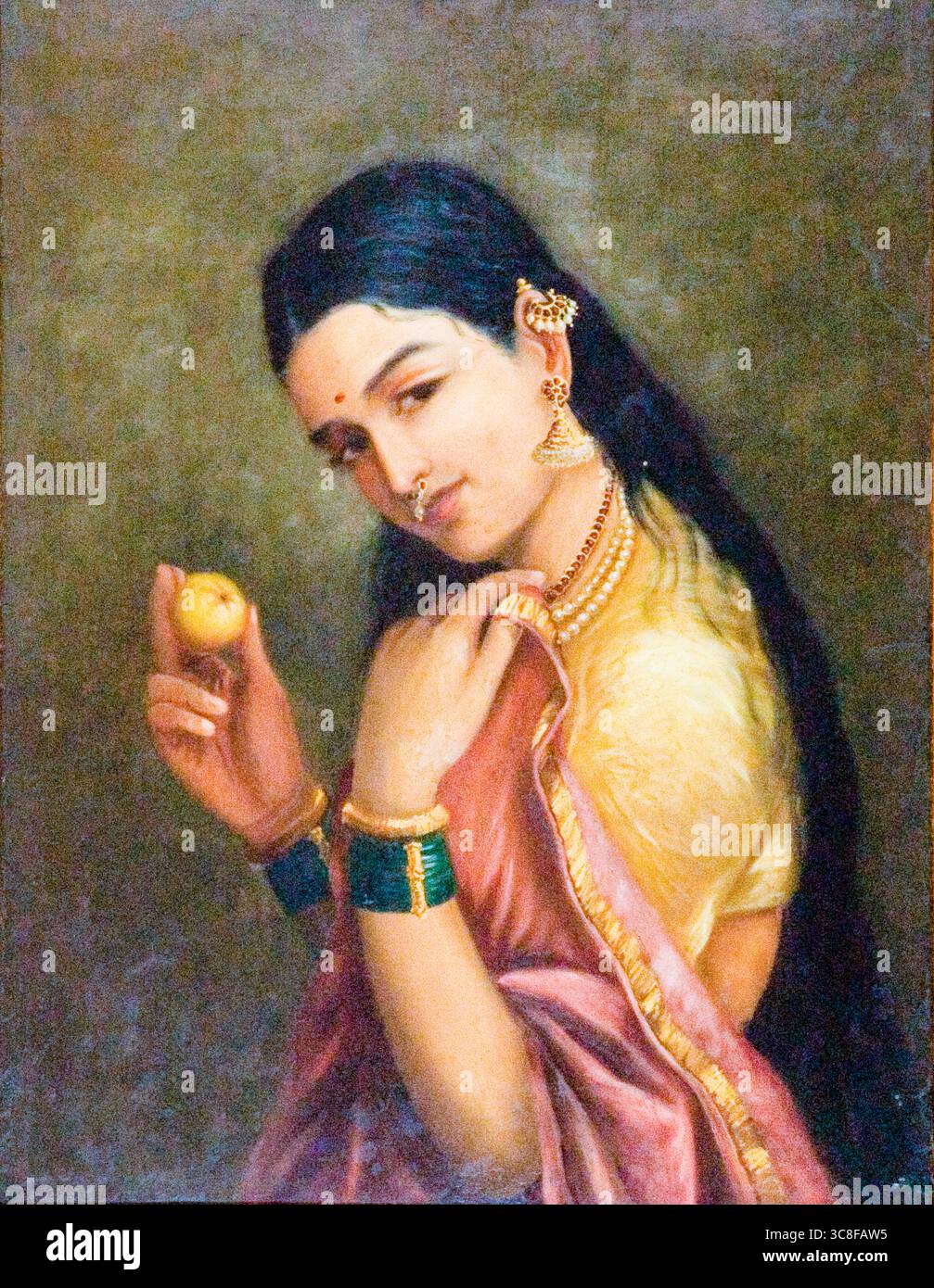 Raja ravi Varma, femme tenant un fruit, portrait peint à l'huile sur toile, 1875-1899 Banque D'Images