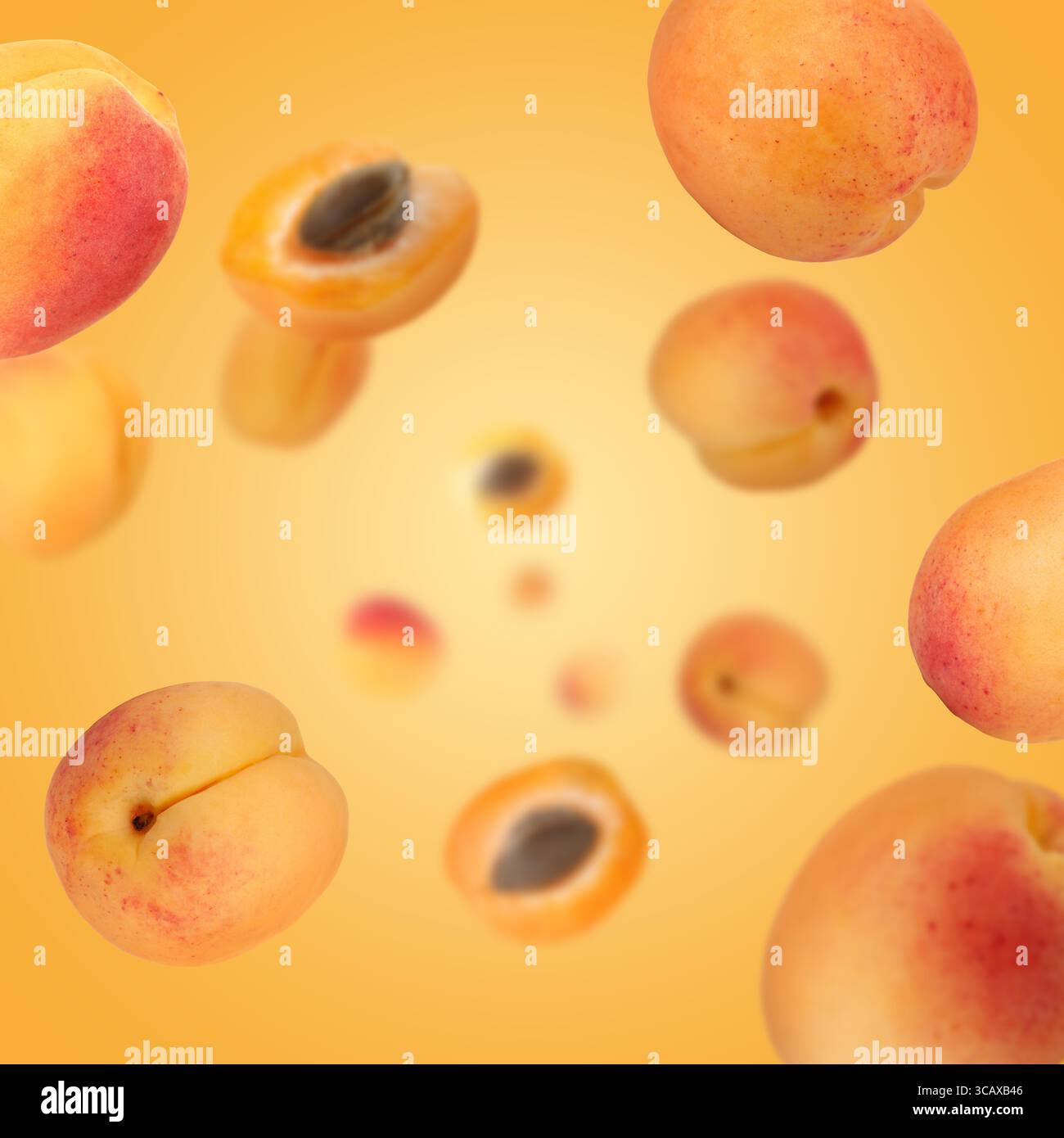 Abricots frais tourbillonnant dans l'air sur fond orange Banque D'Images
