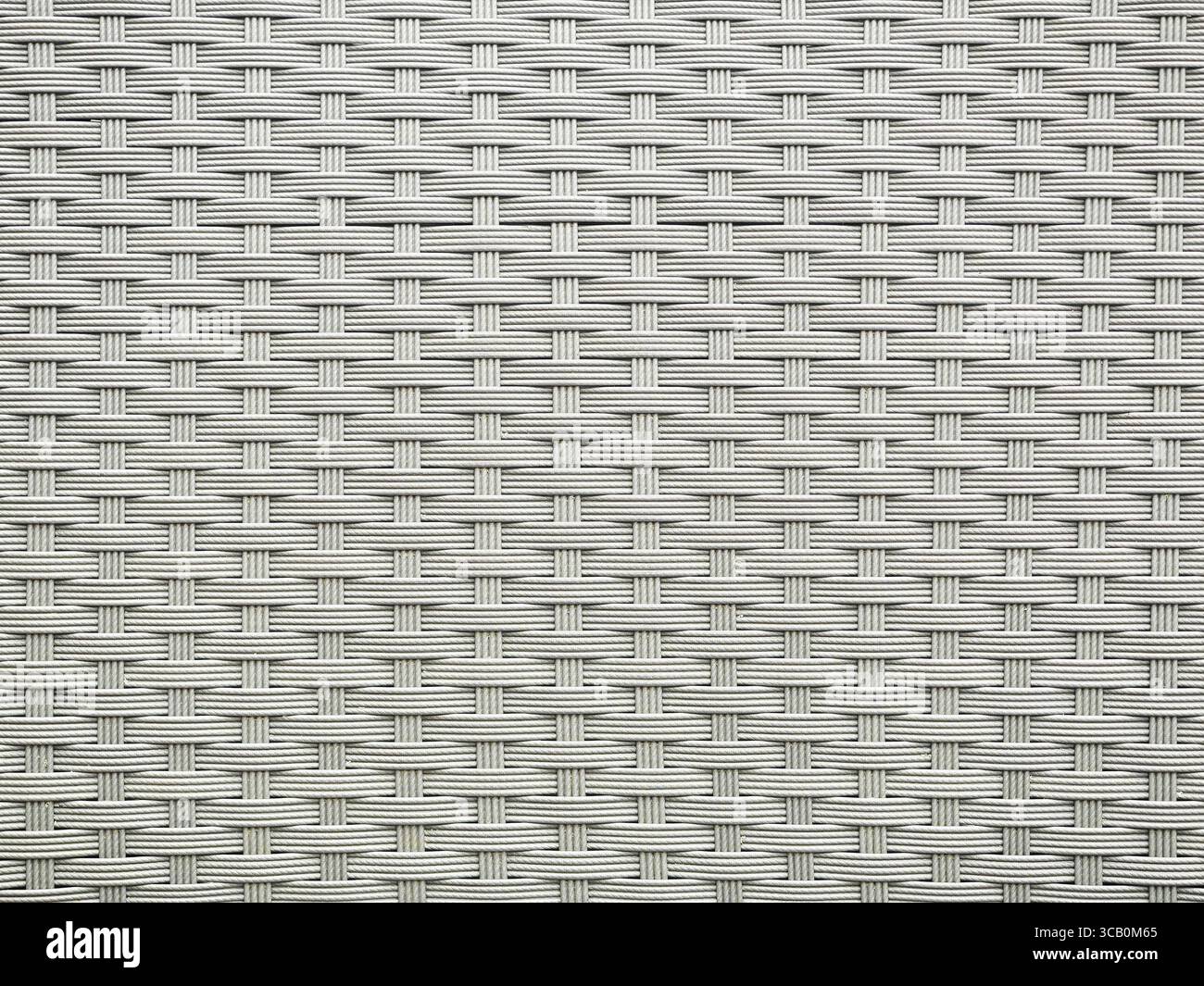 tissage en rotin blanc-gris d'une chaise d'extérieur. – Copyspace Banque D'Images