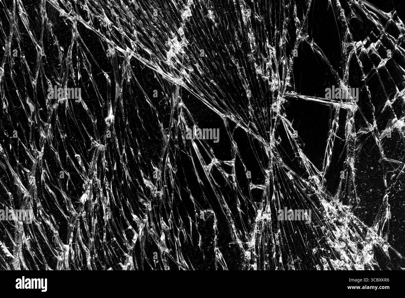 Fond abstrait en verre noir cassé. Fond d'écran noir fissuré du téléphone à écran tactile. Texture pour votre projet Banque D'Images