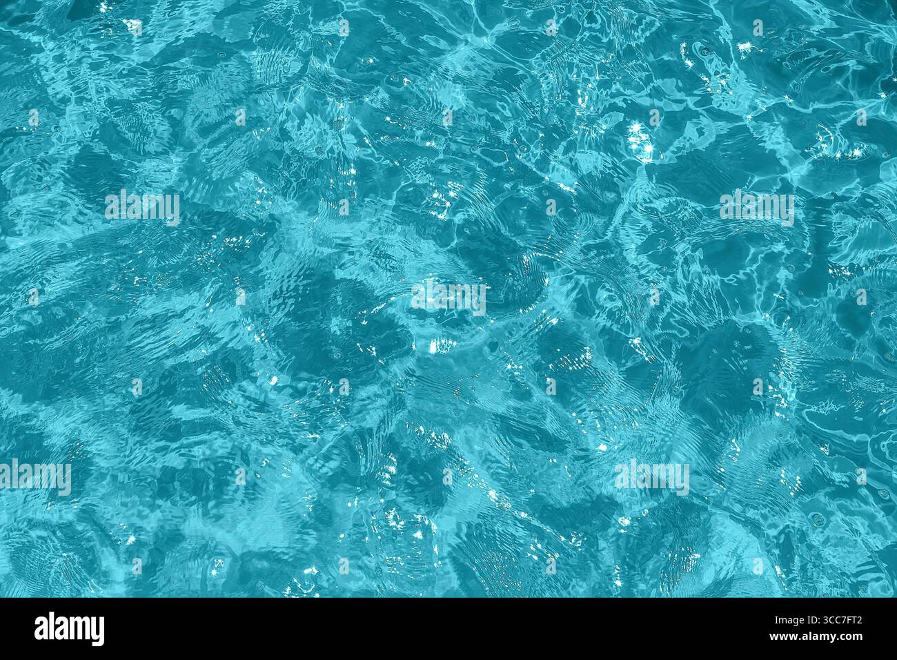 Surface d'eau turquoise avec éblouissement et ondulations. Vue de dessus Banque D'Images