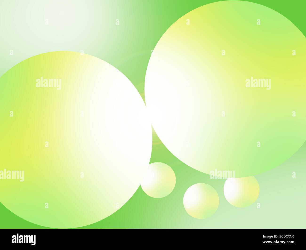 Deux sphères jaunes et vertes s'embrassant. Banque D'Images