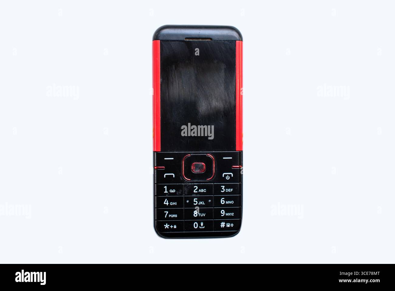 Vieux téléphone mobile fashion style isolé sur fond blanc. Banque D'Images