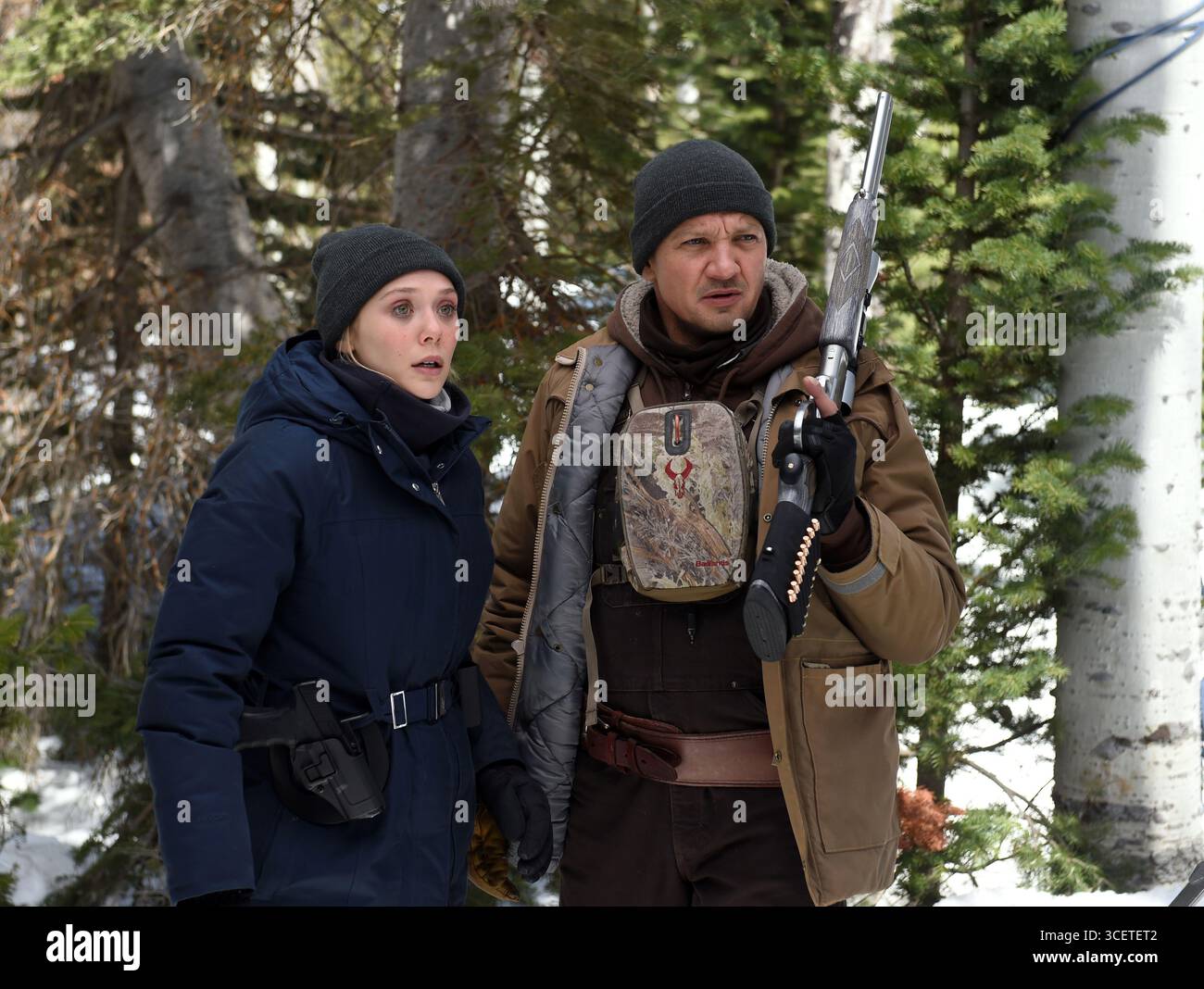 Wind River Jeremy Renner et Elizabeth Olsen Banque D'Images