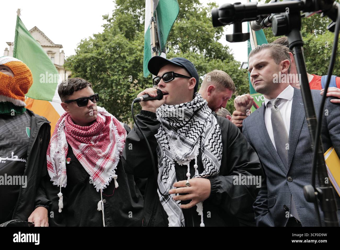 Londres, Royaume-Uni. 20 août 2025, Londres/UKCe était Liam Óg Ó hAnnaidh, alias Mo Chara, deuxième comparution au tribunal de première instance de Westminster, où il fait face à des accusations suite à un incident lors d’un concert à Londres au cours duquel il aurait arboré un drapeau associé à l’organisation interdite Hezbollah. Alamy Live News / Aubrey Fagon Banque D'Images