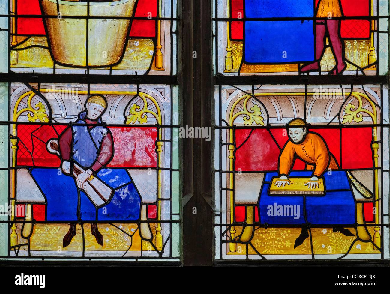 France, Côte d'Or, Semur-en-Auxois, collégiale notre-Dame, vitraux du XVe siècle représentant les métiers, les draperies Banque D'Images