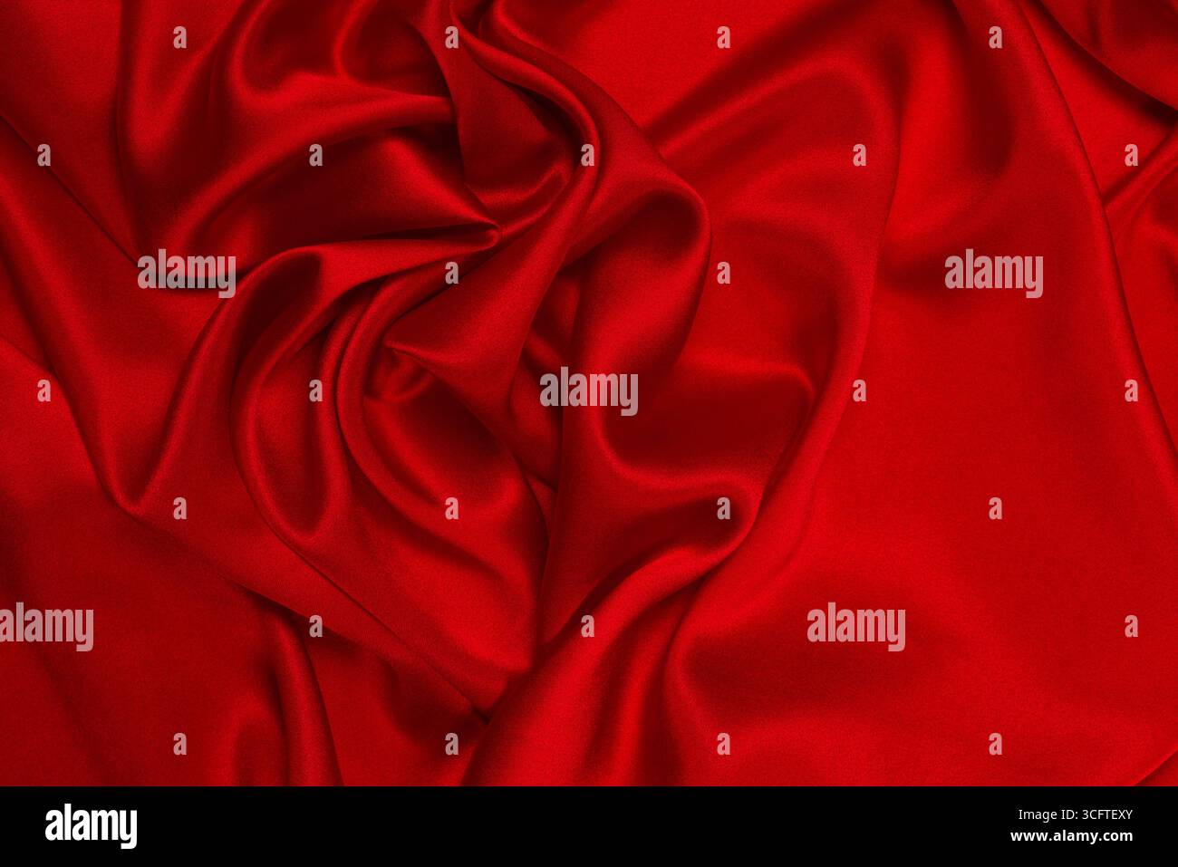 Arrière-plan en soie rouge riche et luxueux.Vue de dessus. Banque D'Images