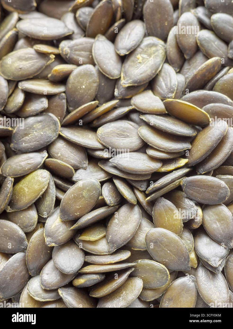 Gros plan photo de graines de citrouille pelées, mise au point sélective. Banque D'Images
