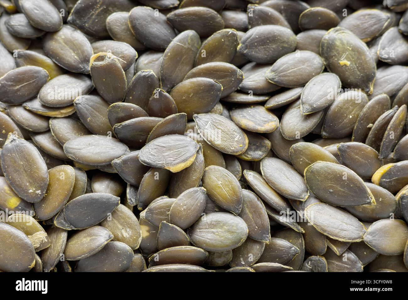 Gros plan photo de graines de citrouille pelées, mise au point sélective. Banque D'Images
