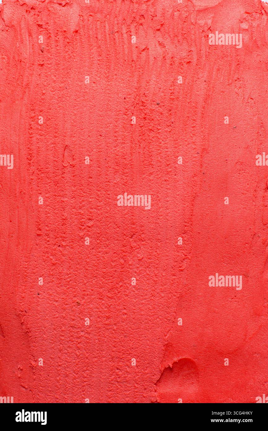 Vue de dessus de crème au beurre rouge pour décorer le gâteau, crème au beurre américain lisse soyeuse avec des motifs, vue de dessus de crème au beurre rouge lisse Banque D'Images