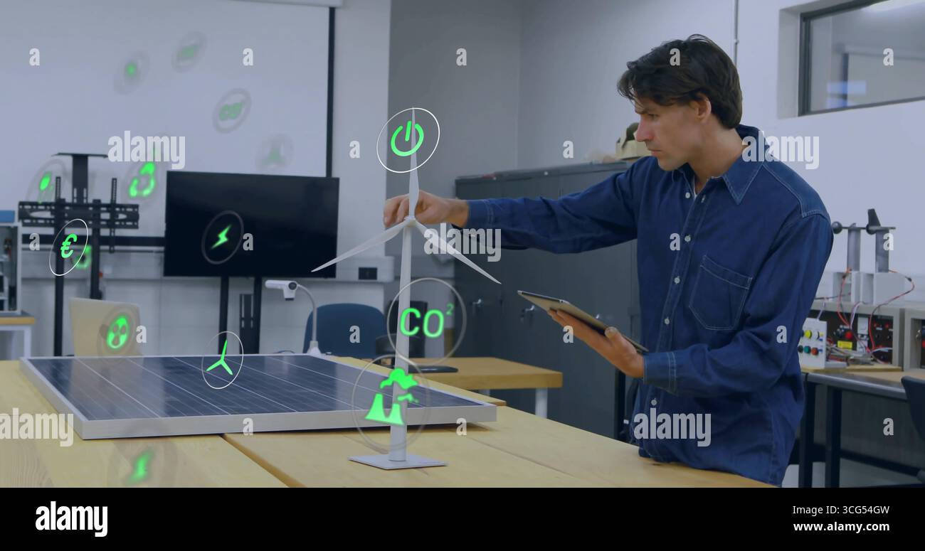 Denim-shirted ingénieur ajustant la turbine dans le laboratoire, avec panneau solaire, tablette, icônes d'énergie, espace de copie Banque D'Images