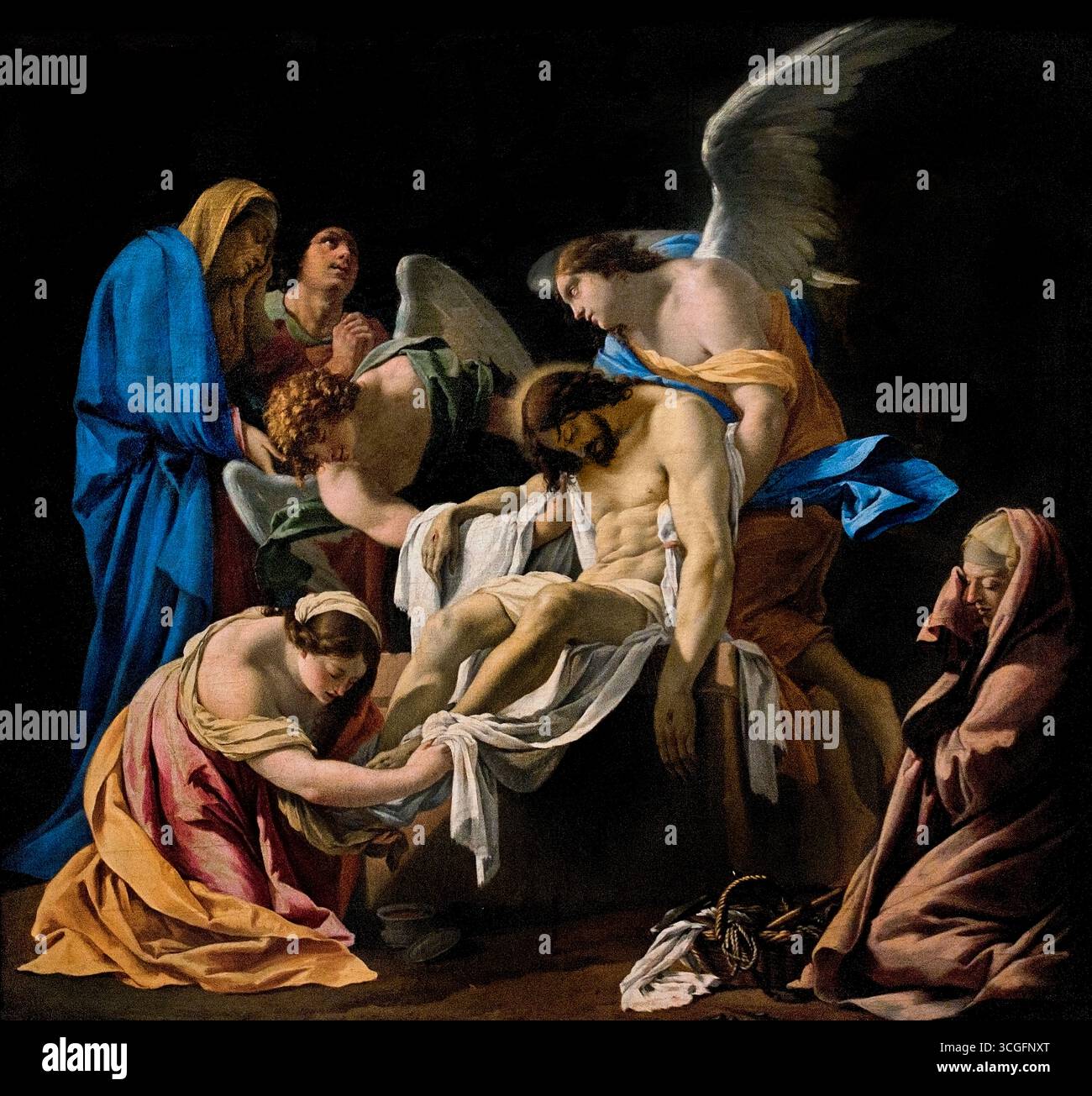 La mise au tombeau par Simon Vouet 1590-1649 Français, ( la 'mise au tombeau du Christ' se réfère à l'événement biblique et ses représentations artistiques où le corps mort du Christ est transporté à la tombe après sa crucifixion et placé à l'intérieur, symbolisant sa mort et son sacrifice. Ce moment sacré sert à illustrer le chagrin et la perte de l'homme, tout en offrant un message profond d'espoir pour la vie éternelle et la rédemption par sa résurrection éventuelle. Banque D'Images
