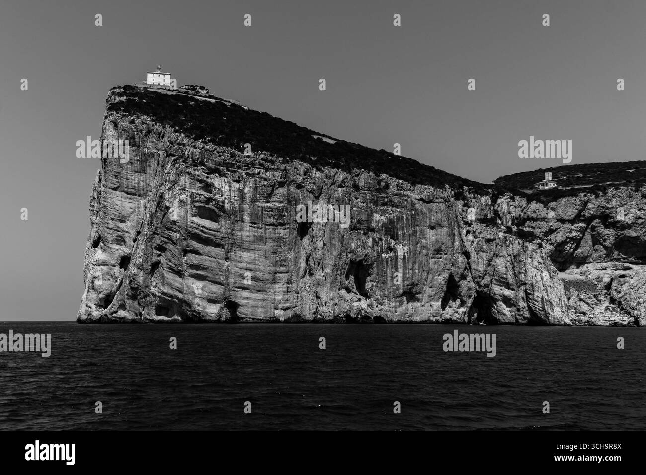 Phare de Capo Caccia perché sur une falaise au point le plus à l'ouest de la Sardaigne Italie. Juin 2025 Banque D'Images