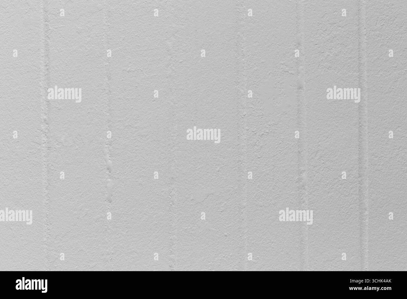 Une texture murale grise calme et douce avec des lignes verticales subtiles, parfaite pour une utilisation comme arrière-plans dans des projets artistiques ou numériques, ajoutant une touche de Banque D'Images Une texture murale grise calme et douce avec des lignes verticales subtiles, parfaite pour une utilisation comme arrière-plans dans des projets artistiques ou numériques, ajoutant une touche de Banque D'Images