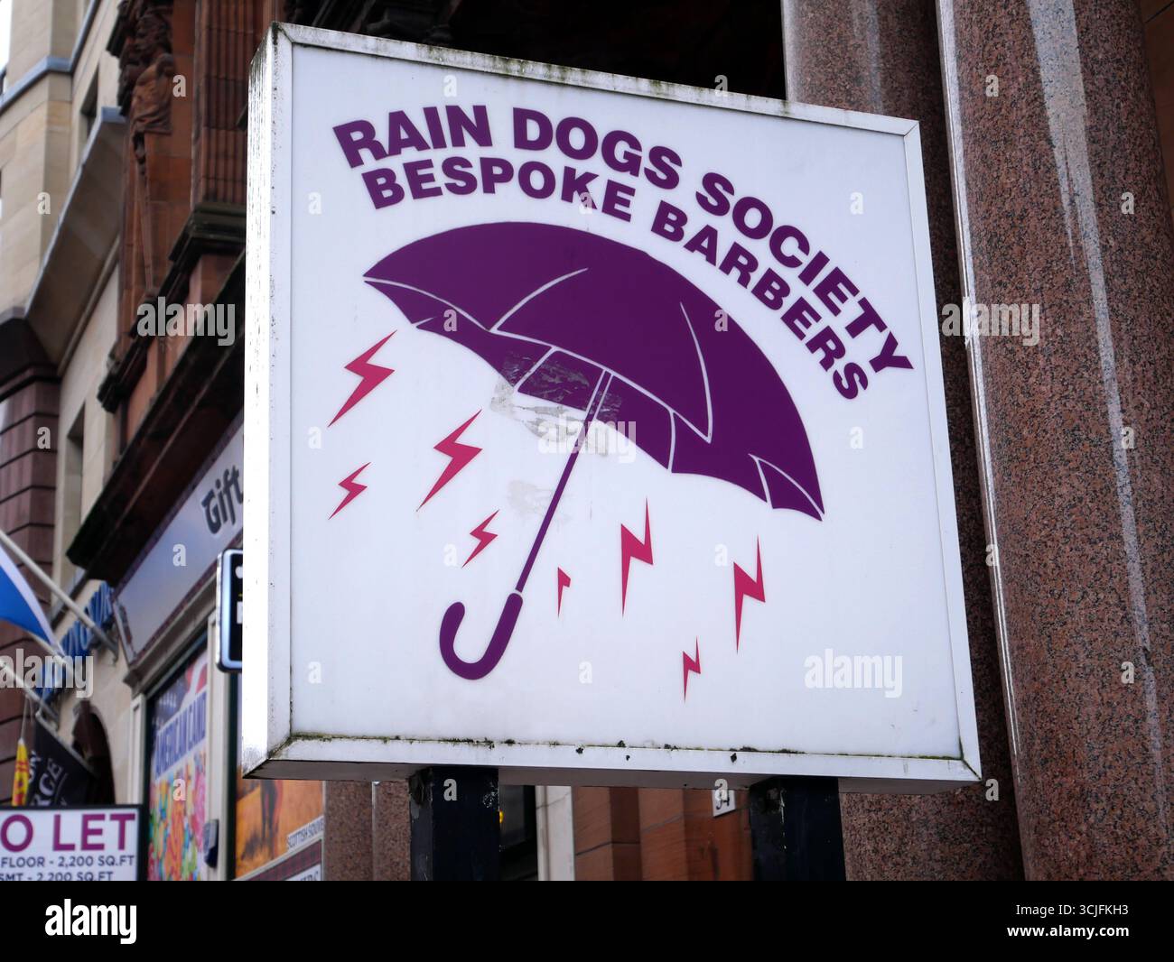 Signez pour Rain Dogs Society Bespoke Barbers à Glasgow, Écosse, Royaume-Uni Banque D'Images