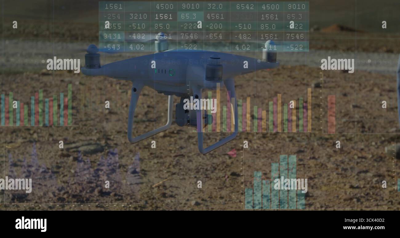 Drone quadcopter planant envoyant des données sur un champ désertique sec, avec des tableaux numériques et des graphiques à barres Banque D'Images