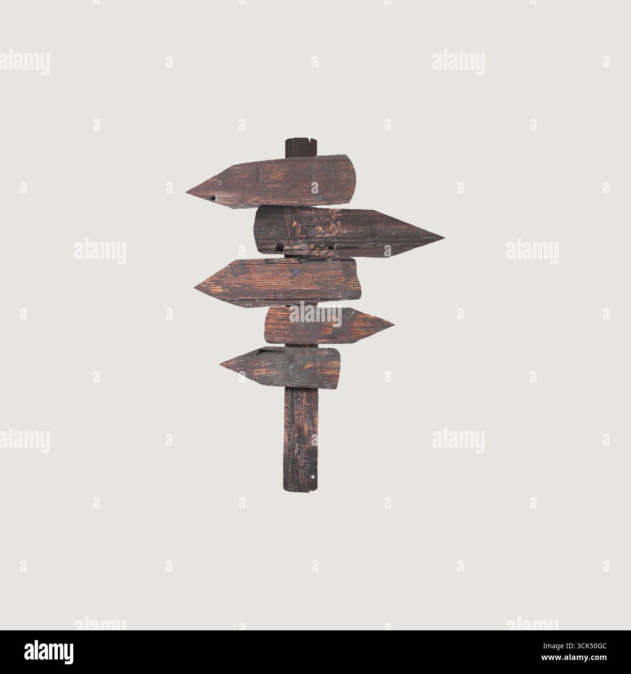 Un panneau rustique en bois avec plusieurs flèches, indiquant différentes directions. Banque D'Images Un panneau rustique en bois avec plusieurs flèches, indiquant différentes directions. Banque D'Images