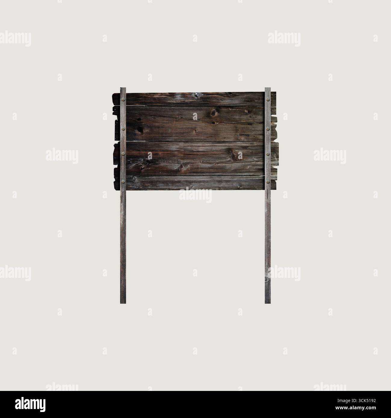 Un panneau en bois rustique sur un stand, vierge et prêt pour des messages ou des informations. Banque D'Images Un panneau en bois rustique sur un stand, vierge et prêt pour des messages ou des informations. Banque D'Images