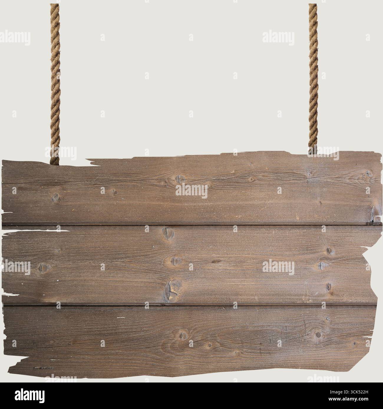 Un signe en bois suspendu à des cordes, adapté à diverses fins de signalisation. Banque D'Images Un signe en bois suspendu à des cordes, adapté à diverses fins de signalisation. Banque D'Images