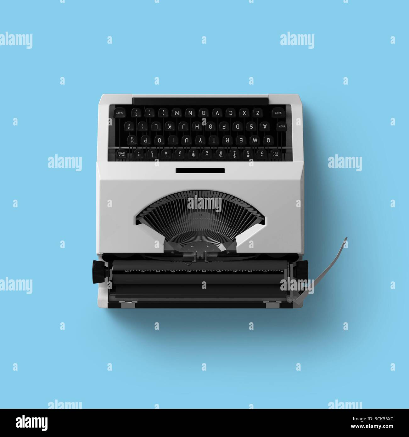 Une machine à écrire vintage avec un design classique, présentant les touches et le mécanisme d'alimentation du papier. Banque D'Images