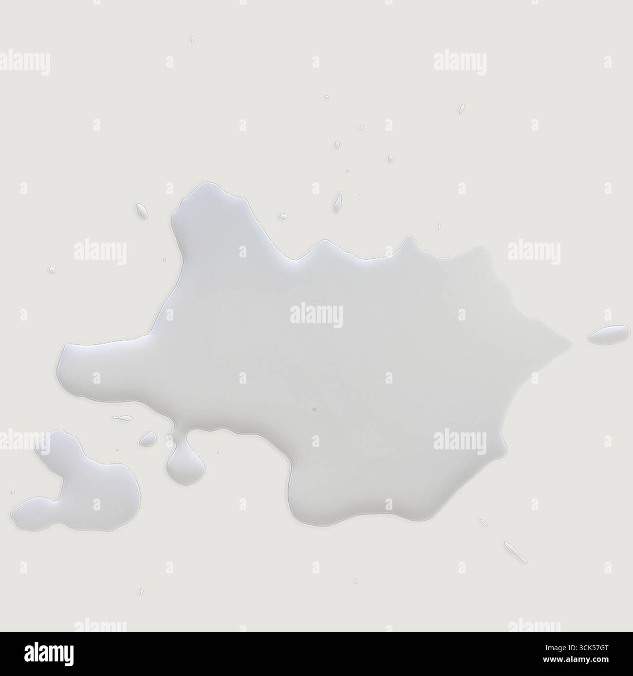 Une éclaboussure de liquide blanc ressemblant à du lait renversé sur une surface plane. Banque D'Images Une éclaboussure de liquide blanc ressemblant à du lait renversé sur une surface plane. Banque D'Images