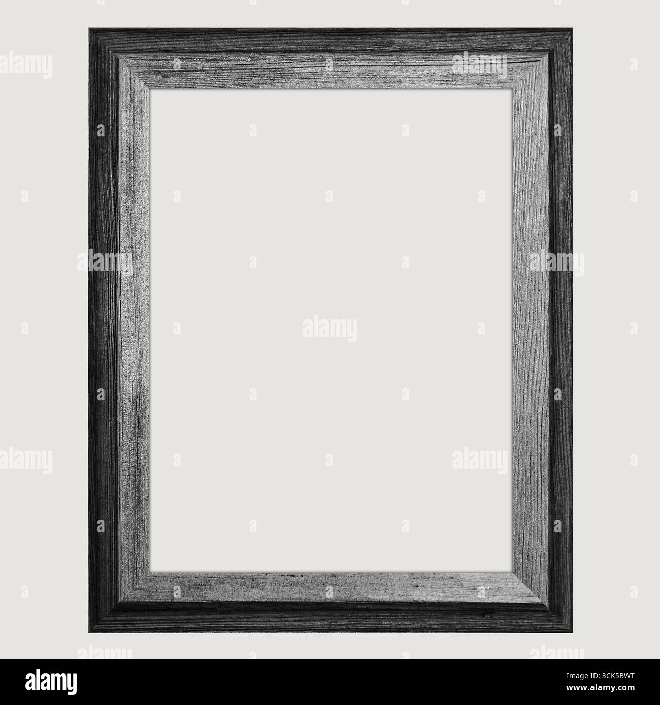 Un simple cadre photo en bois avec un design classique, vide et prêt pour une œuvre d'art ou une photographie. Banque D'Images
