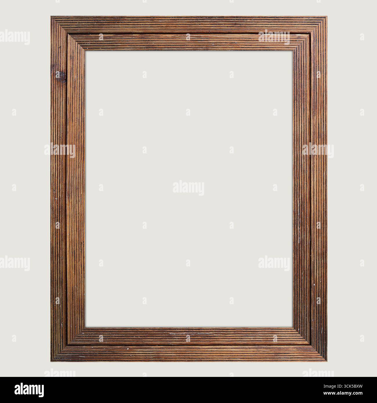 Un cadre photo en bois avec un design classique, adapté à l'affichage d'œuvres d'art ou de photographies. Banque D'Images