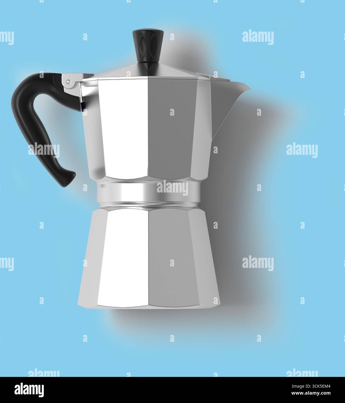 Un pot moka argenté utilisé pour préparer du café, avec un design classique avec une poignée et un bec verseur. Banque D'Images