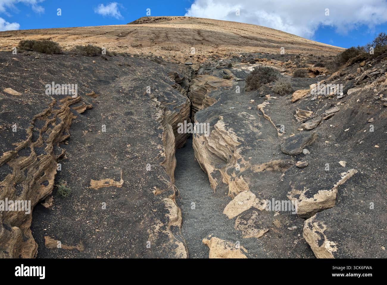 Entrée à Las Grietas Slot Canyon, Lanzarote, Îles Canaries, Espagne. Banque D'Images