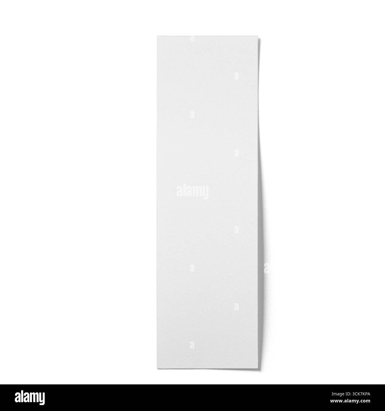 Une feuille blanche de papier blanc, légèrement courbée, suggérant un potentiel de créativité ou de documentation. Banque D'Images