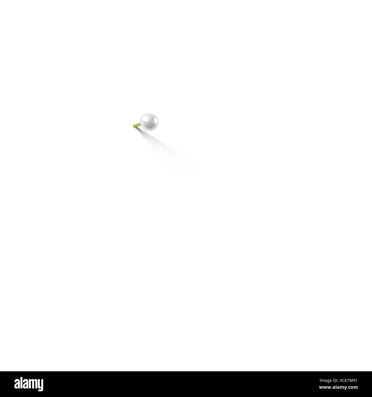 Une animation simple d'une perle roulant sur une surface vierge, créant une sensation de mouvement et d'élégance. Banque D'Images