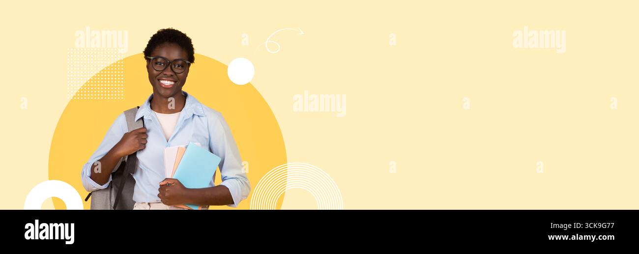 Étudiant lumineux et confiant prêt à apprendre dans un cadre scolaire moderne Banque D'Images