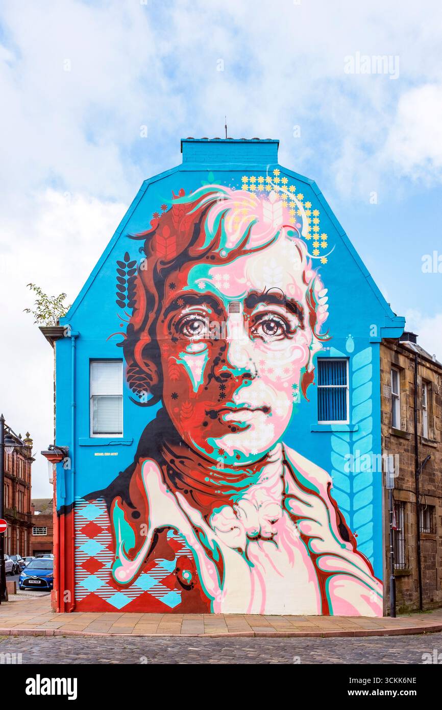 Peinture murale de Robert Burns, poète écossais, peinte sur le mur d'extrémité du gabble des bureaux de Robert Burns World Federation Ltd, rue John Dickie, Kilmarnock, Banque D'Images