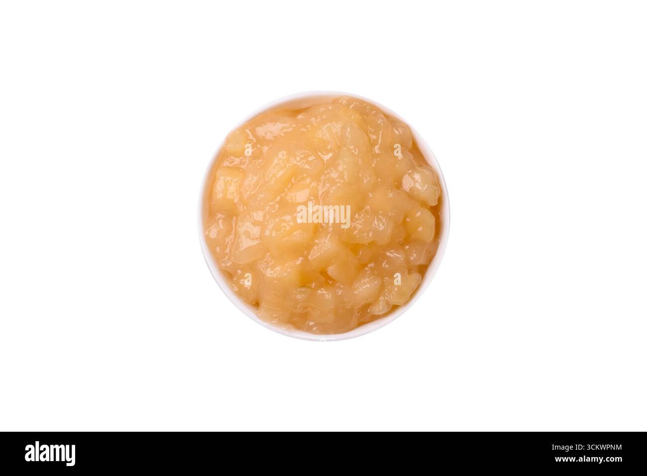 Sauce sucrée à la pomme, nourriture pour bébé, ingrédient en conserve pour les desserts. Sauce de pomme comme fond de nourriture pour votre conception Banque D'Images