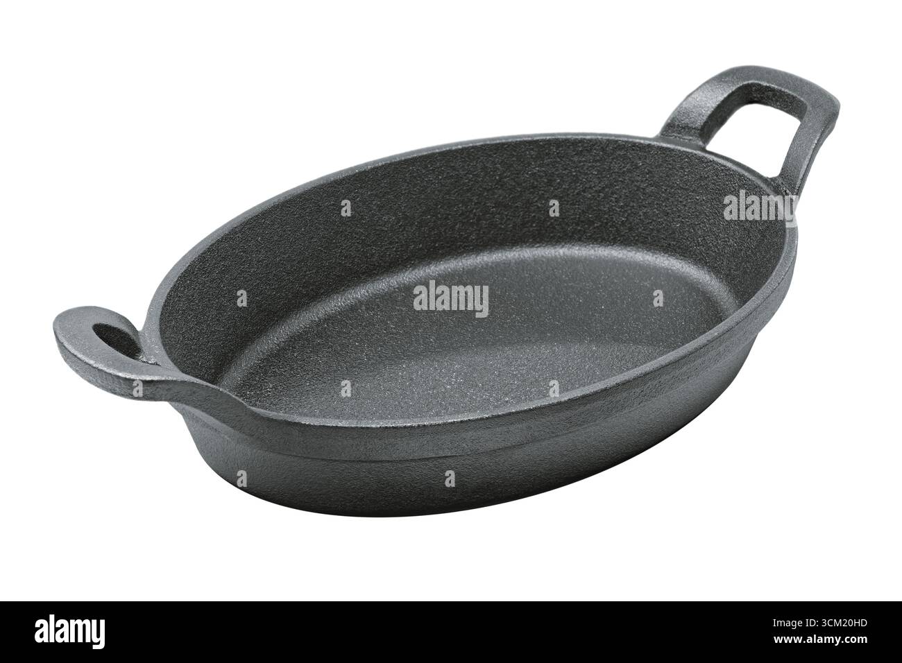 Poêle ovale en fonte, isolé sur fond blanc Banque D'Images