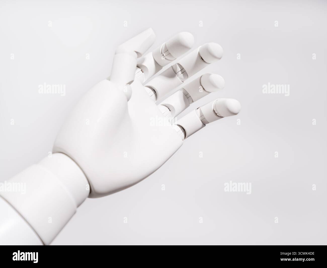 La main du robot est sur fond blanc Banque D'Images