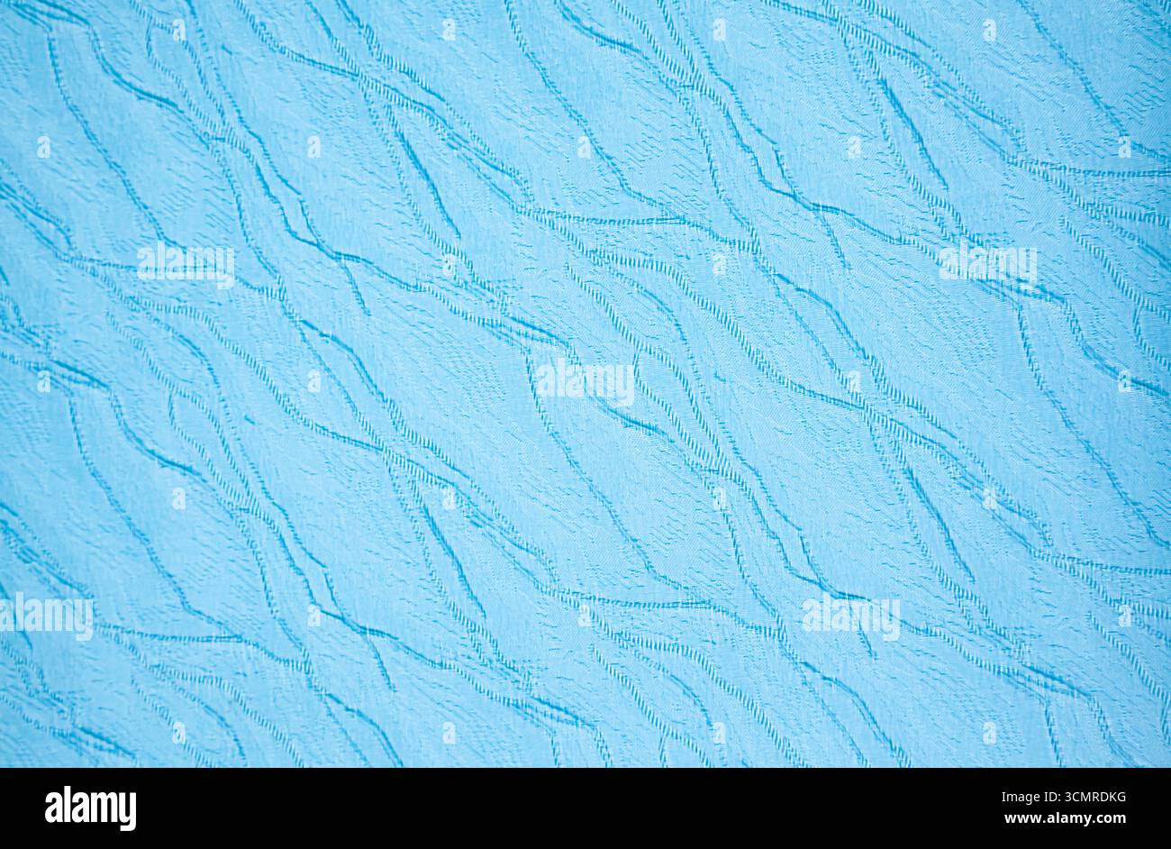Texture de tissu bleu avec un motif ondulé. Banque D'Images