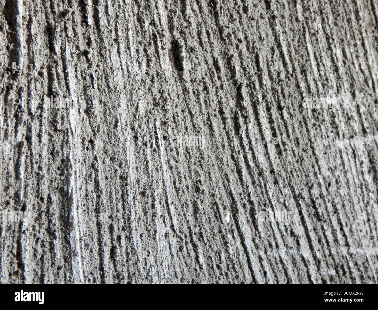 Plâtre décoratif. Texture bois sur plâtre. Gros plan. Banque D'Images