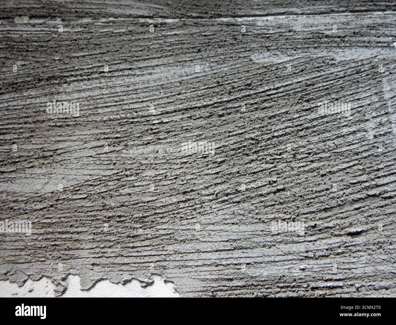 Plâtre décoratif. Texture bois sur plâtre. Gros plan. Banque D'Images