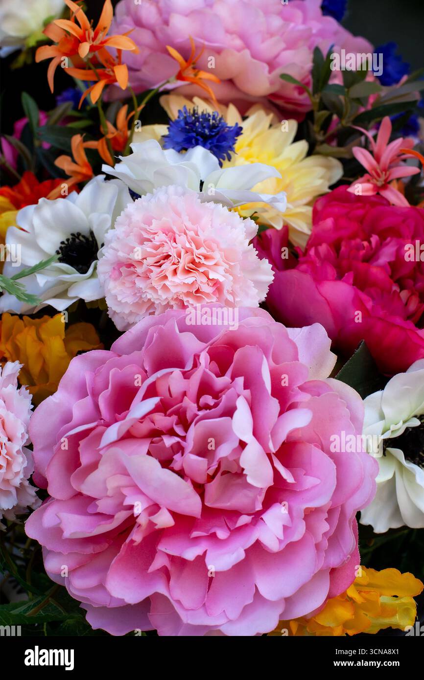 Fond de fleurs en plastique colorées Banque D'Images
