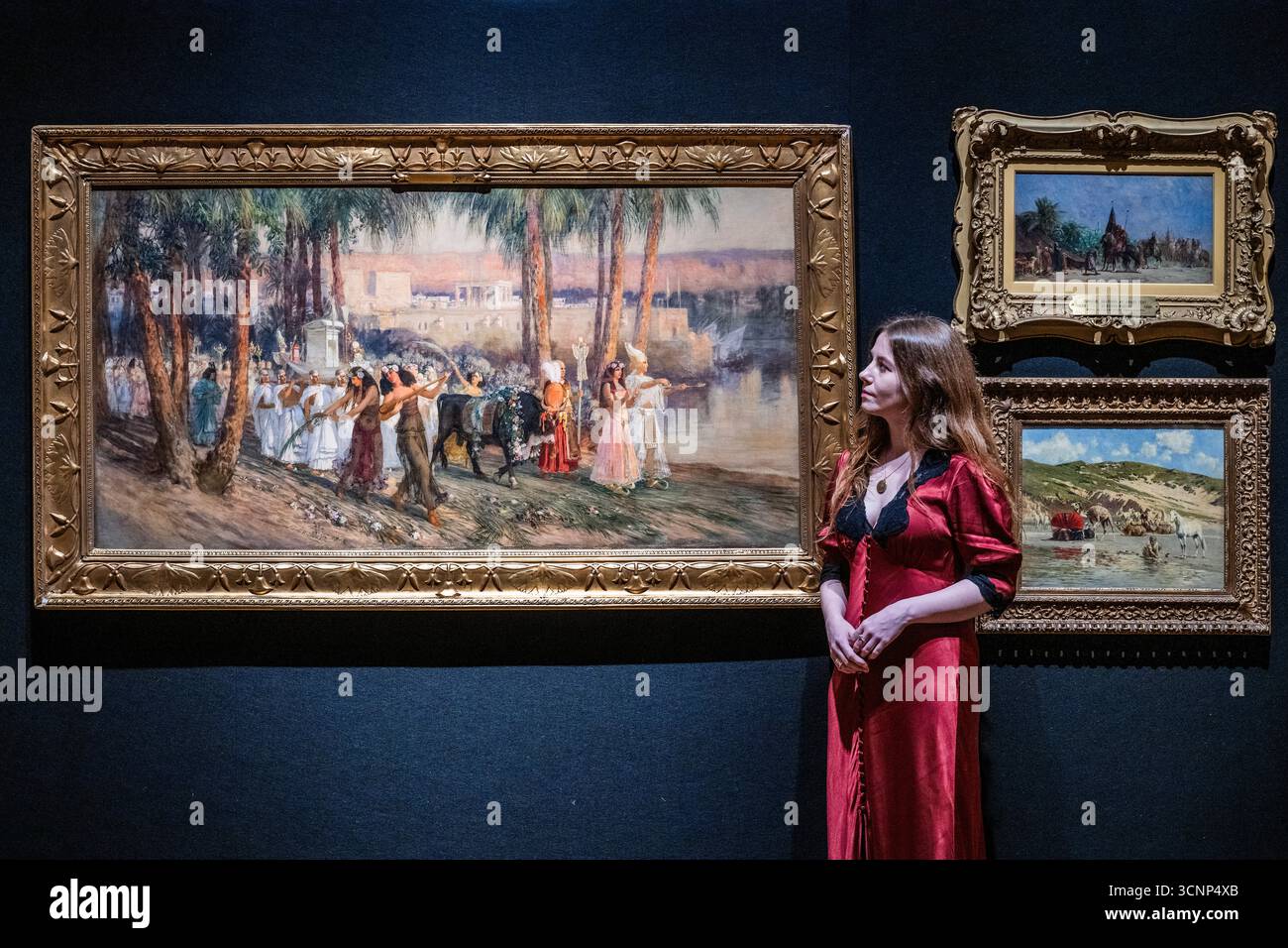 Londres, Royaume-Uni. 22 septembre 2025. Un cortège égyptien de Frederick Arthur Bridgman, estimé £40 000 - £60 000 et autres œuvres - avant-première pour le 19ème siècle et la vente d'art impressionniste britannique à Bonhams New Bond Street, Londres. Crédit : Guy Bell/Alamy Live News Banque D'Images